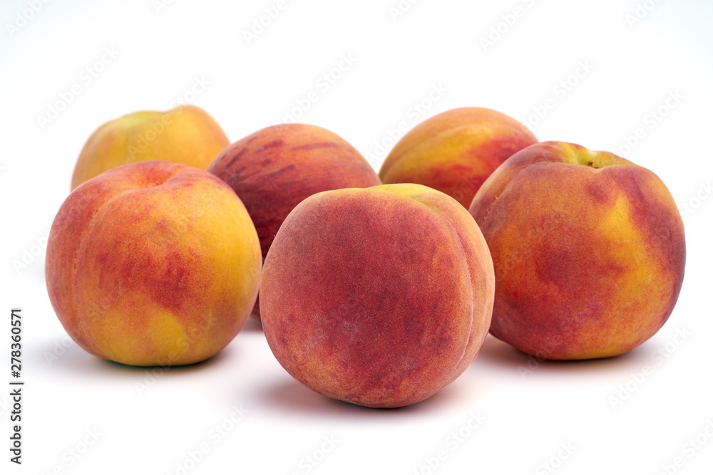 Several peaches isolated on white background. Several peaches isolated on white background.