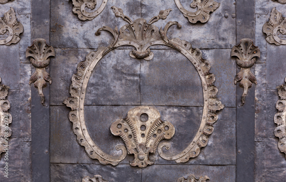 Detail of a baroque door at a historic building Detail of a baroque door at a historic building