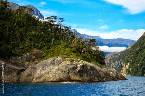 Rugged granite headland that marks the entrance to New Zealand's heritage listed Milford Sound. © Norman