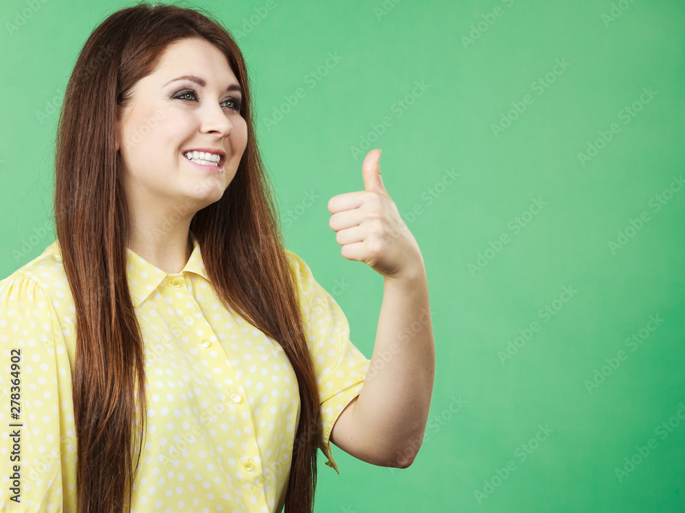 Woman making thumb up gesture Woman making thumb up gesture