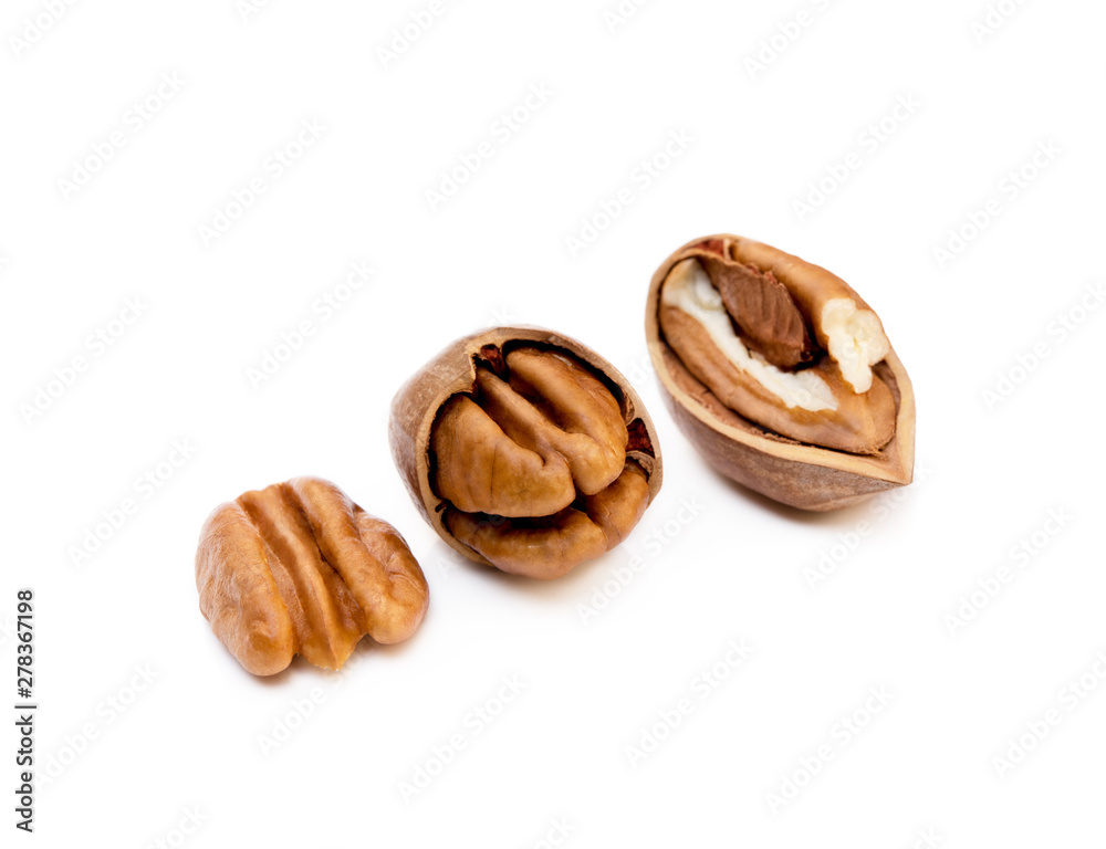 Fresh pecan nuts isolated on a white background Fresh pecan nuts isolated on a white background