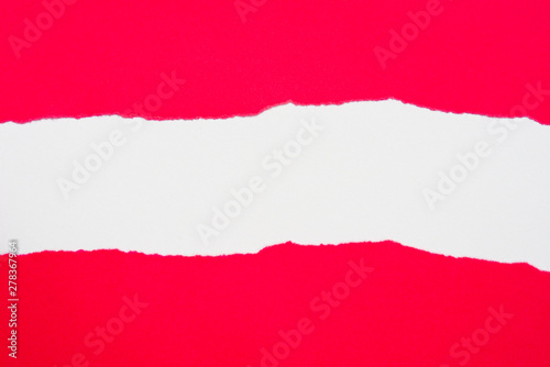 red pieces of paper on white background with copy space