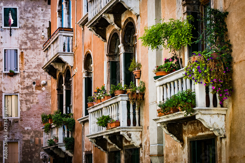 Fototapeta Naklejka Na Ścianę i Meble -  Elements of architecture of houses on the streets of the canals of the city of Venice in Italy. 