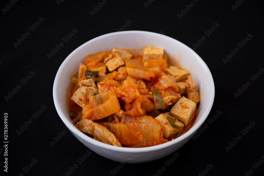 A Korean stew with fermented kimchi called Kimchi Jjigae A Korean stew with fermented kimchi called Kimchi Jjigae