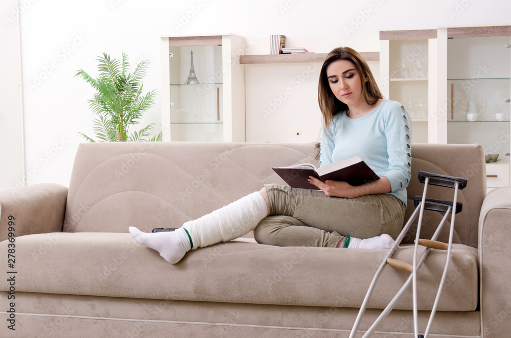 Young woman after car accident suffering at home Young woman after car accident suffering at home