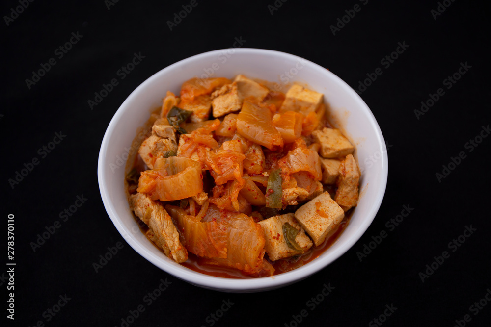 A Korean stew with fermented kimchi called Kimchi Jjigae A Korean stew with fermented kimchi called Kimchi Jjigae