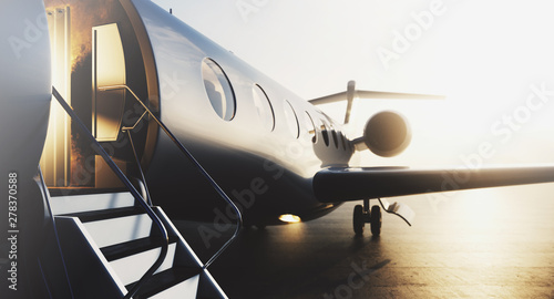 Fotografia, Obraz Business private jet airplane parked at terminal