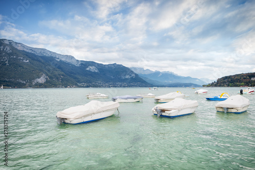 Lake of Annecy. Moody landscape with boats