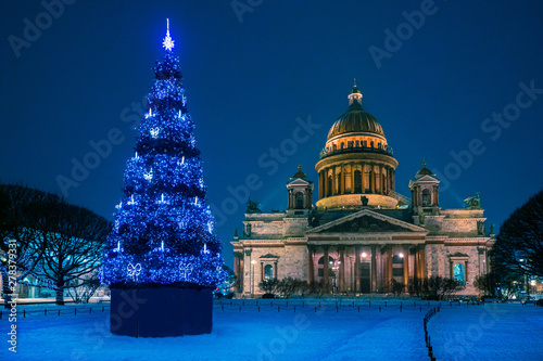 Saint Petersburg, Russia. Christmas tree with blue garlands. Night illuminations Petersburg. Christmas in SPb. Christmas tree on the square of St. Petersburg.