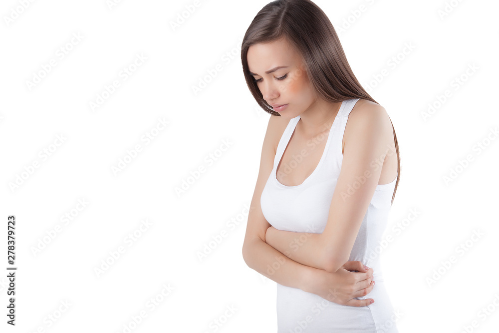 Woman on isolated white background having head or stomach ache. Female closeup feeling sick. Lady feels pain. Woman on isolated white background having head or stomach ache. Female closeup feeling sick. Lady feels pain.