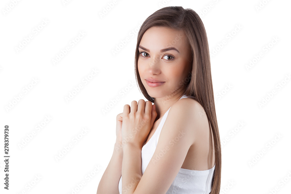 Attractive young woman on isolated white background. Closeup portrait of beautiful female looking at camera.