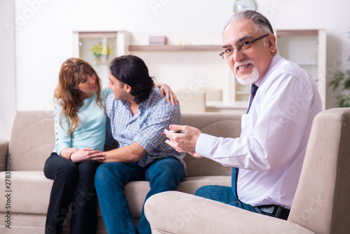 Young pair visiting experienced doctor psychologist