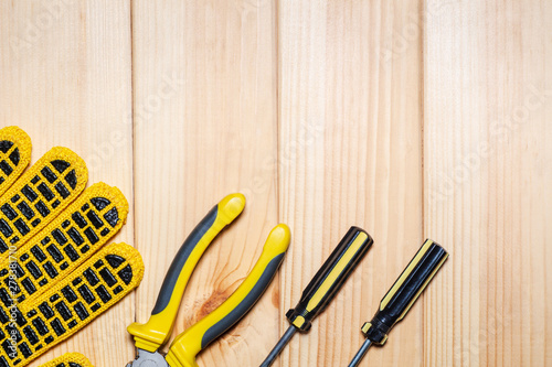 Construction tool on wood board maintenance concept.