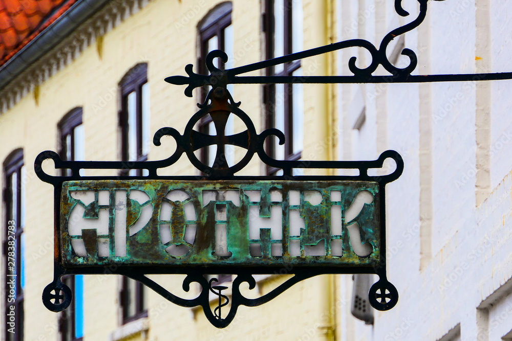 Sæby, Denmark An old and antique apothek sign for the pharmacy. Sæby, Denmark An old and antique apothek sign for the pharmacy.