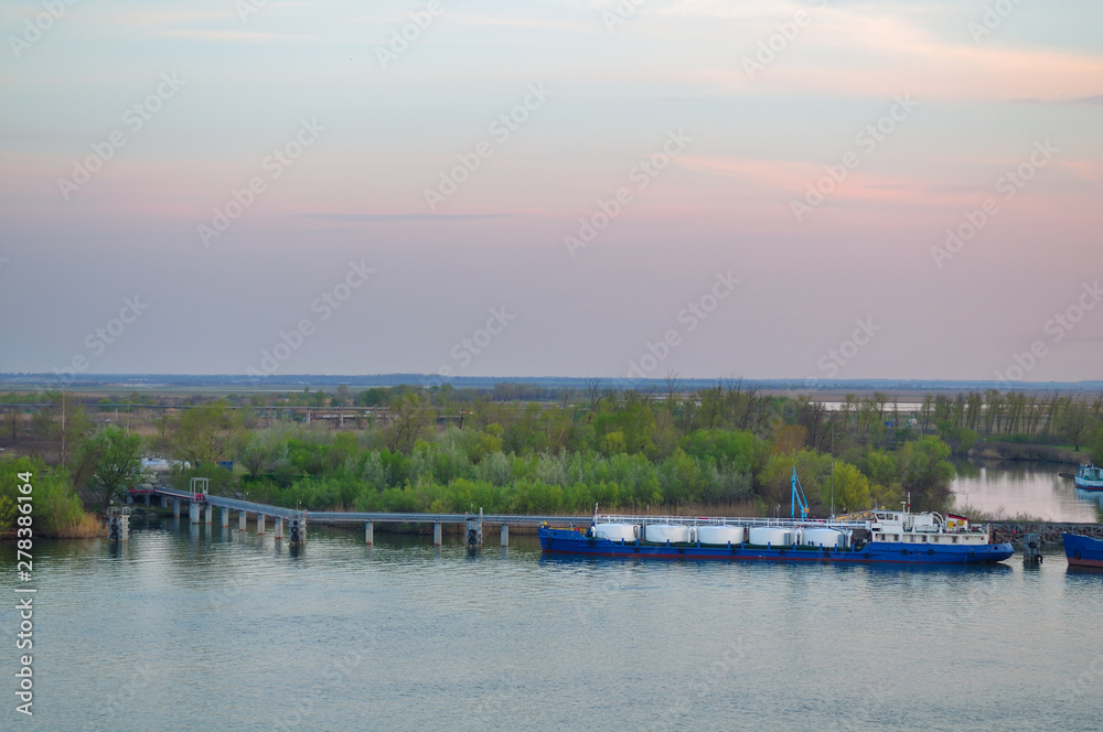 A tanker offloads oil into the vault