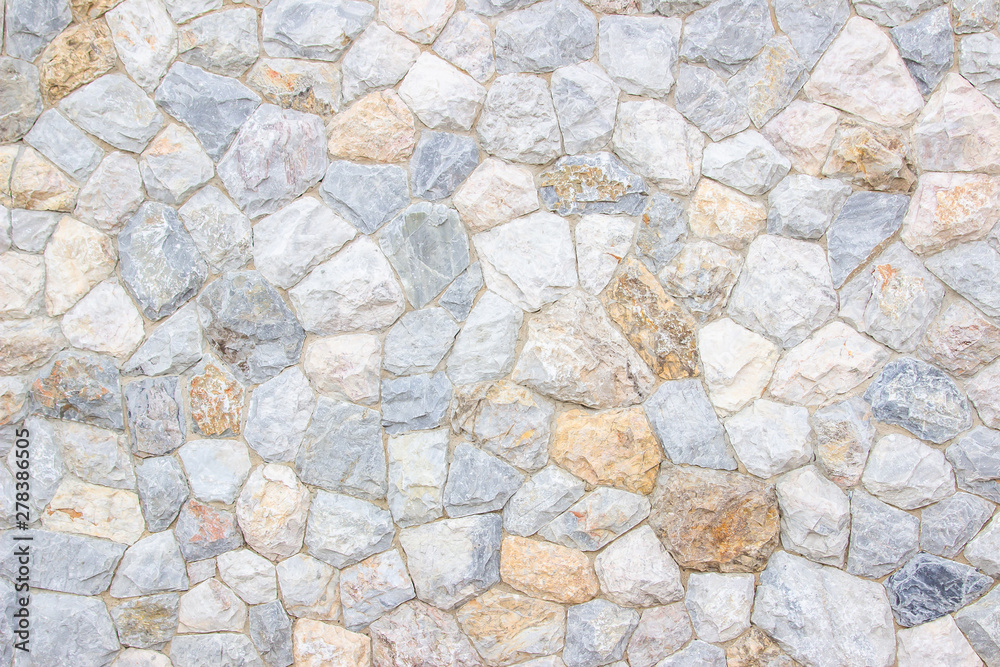 Brick stone wall stack of medieval natural stone texture background or