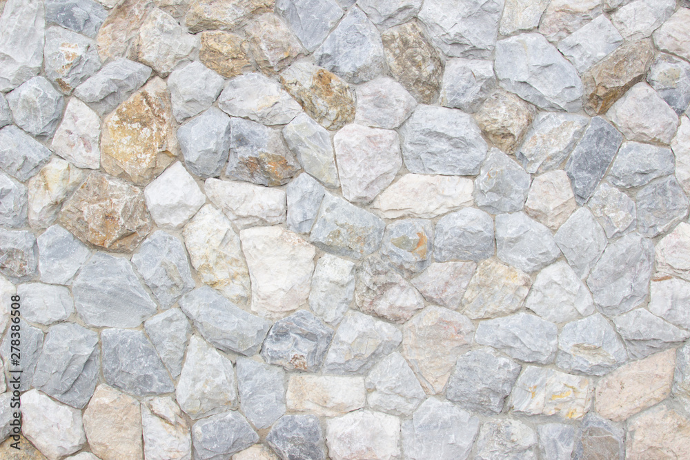 Brick stone wall stack of medieval natural stone texture background or rock strata boundary the rock seamless abstract and fragment of a walls from a gray. Brick stone wall stack of medieval natural stone texture background or rock strata boundary the rock seamless abstract and fragment of a walls from a gray.