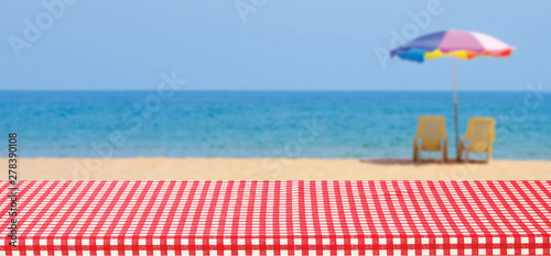 Photography Table top and beach sand for picnic vacation, food, drink, product display backg