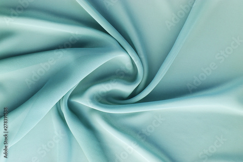 turquoise fabric with large folds