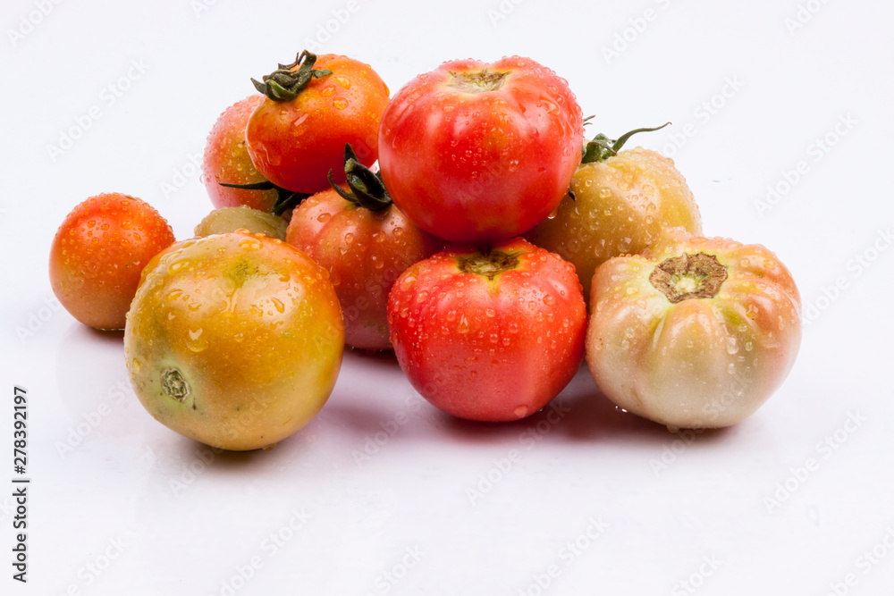 Red tomatoes - white background.