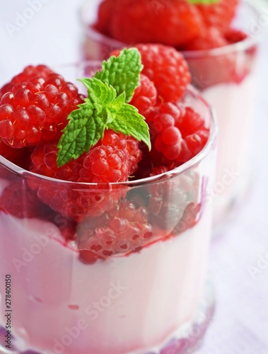 Delicious dessert of ripe raspberries.Healthy diet.