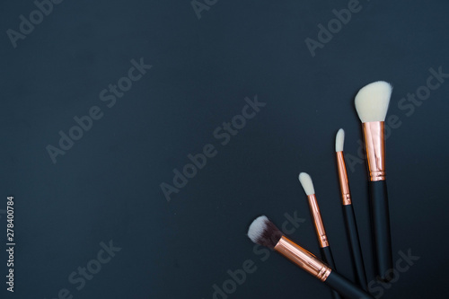 make up brushes on black