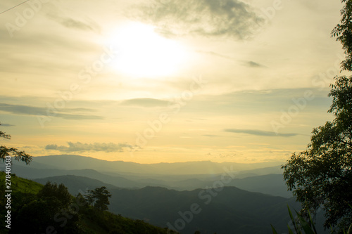 The longitudinal mountains and the setting sun and the forest on Doi Tung