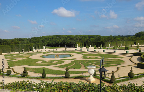 Beautiful garden in a Famous palace Versailles. The Palace Versailles was a royal castle . Paris, France.