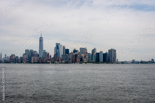 Skyline and modern office buildings of Midtown Manhattan viewed from across the Hudson River. - Image © ako-photography
