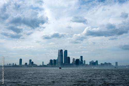 Skyline and modern office buildings of Midtown Manhattan viewed from across the Hudson River. - Image