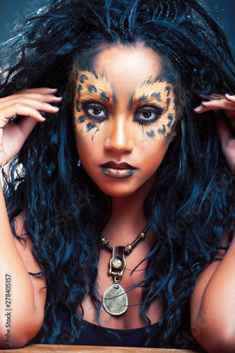 beauty afro girl with cat make up, creative leopard print closeup, fashion style halloween look