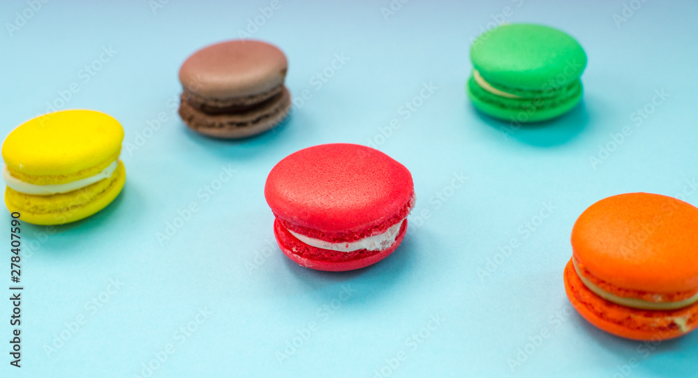 Close-up shot of colored macaroons in different position Close-up shot of colored macaroons in different position