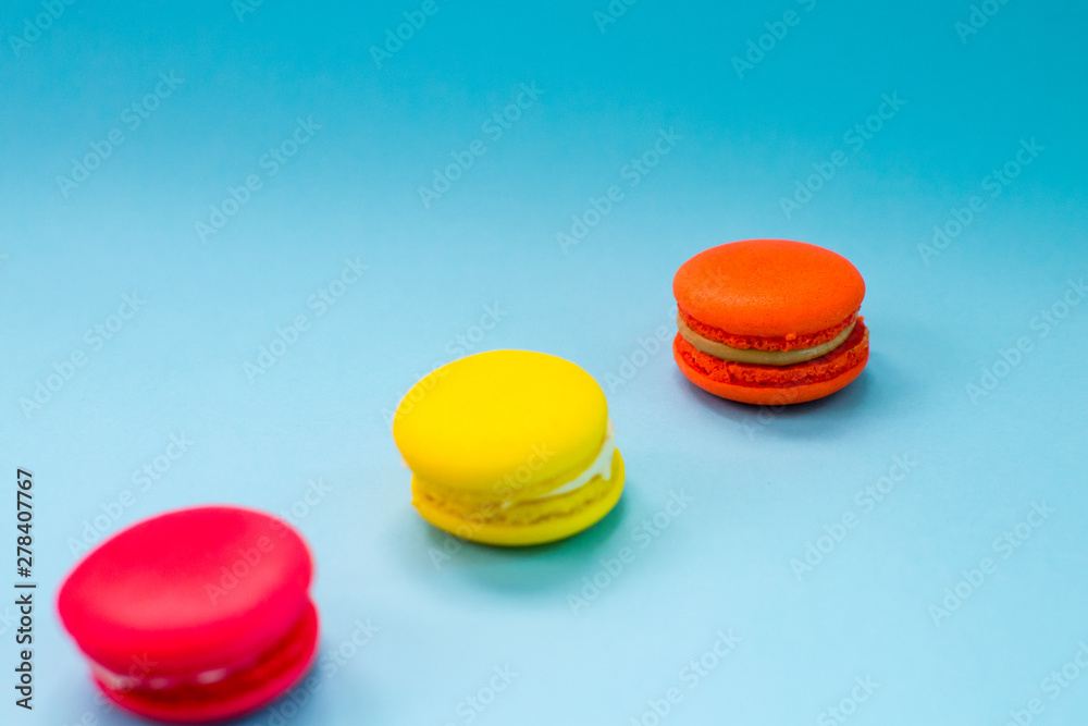 Close-up shot of colored macaroons in different position Close-up shot of colored macaroons in different position