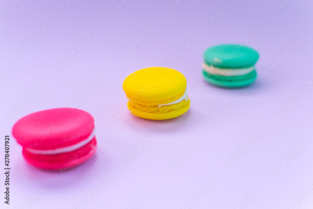 Close-up shot of colored macaroons in different position Close-up shot of colored macaroons in different position