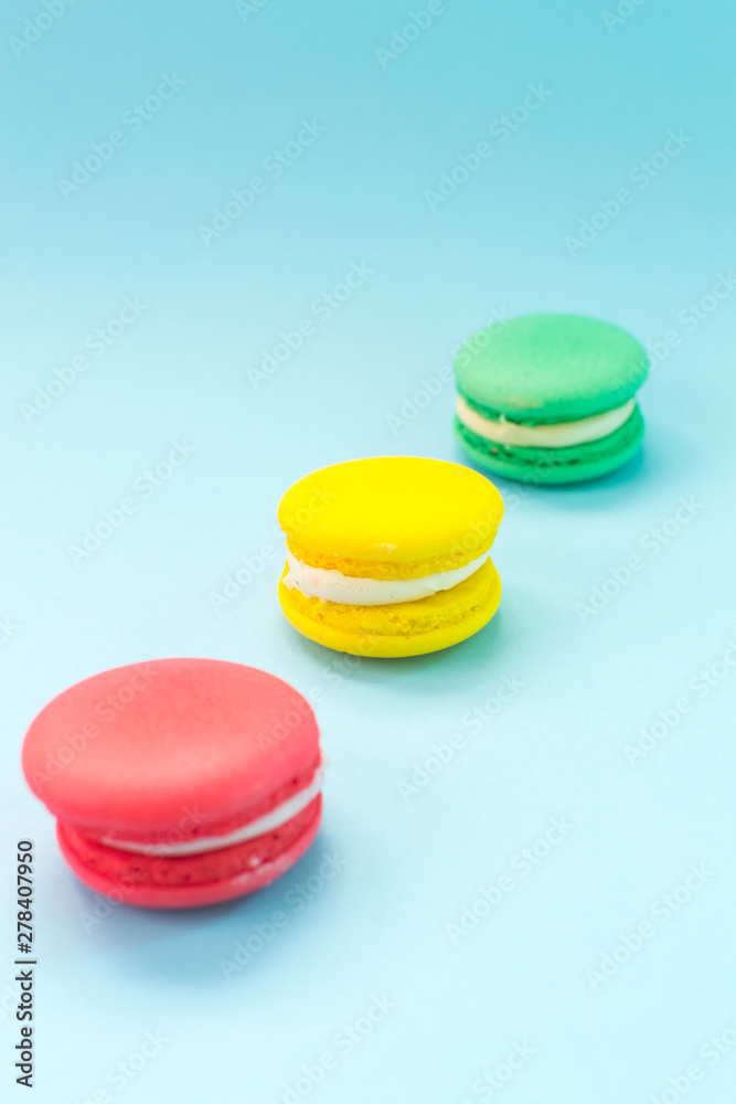 Close-up shot of colored macaroons in different position Close-up shot of colored macaroons in different position