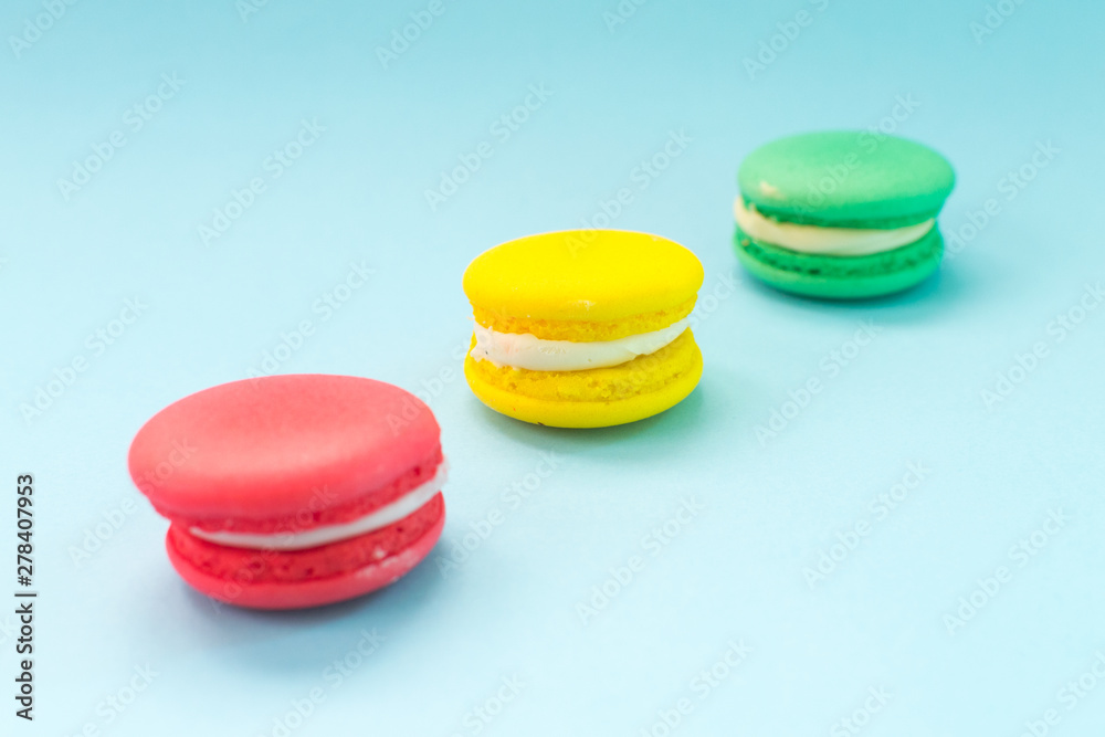 Close-up shot of colored macaroons in different position Close-up shot of colored macaroons in different position