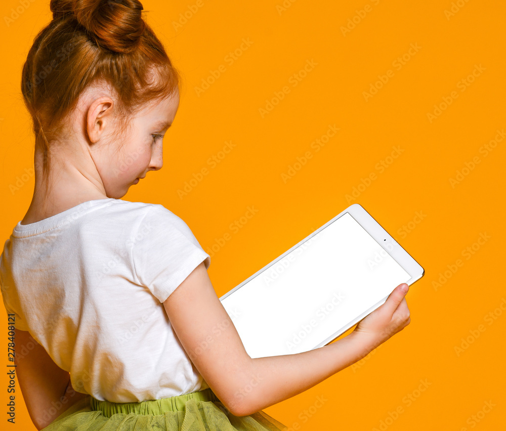 Happy child with tablet computer. Kid showing Happy child with tablet computer. Kid showing