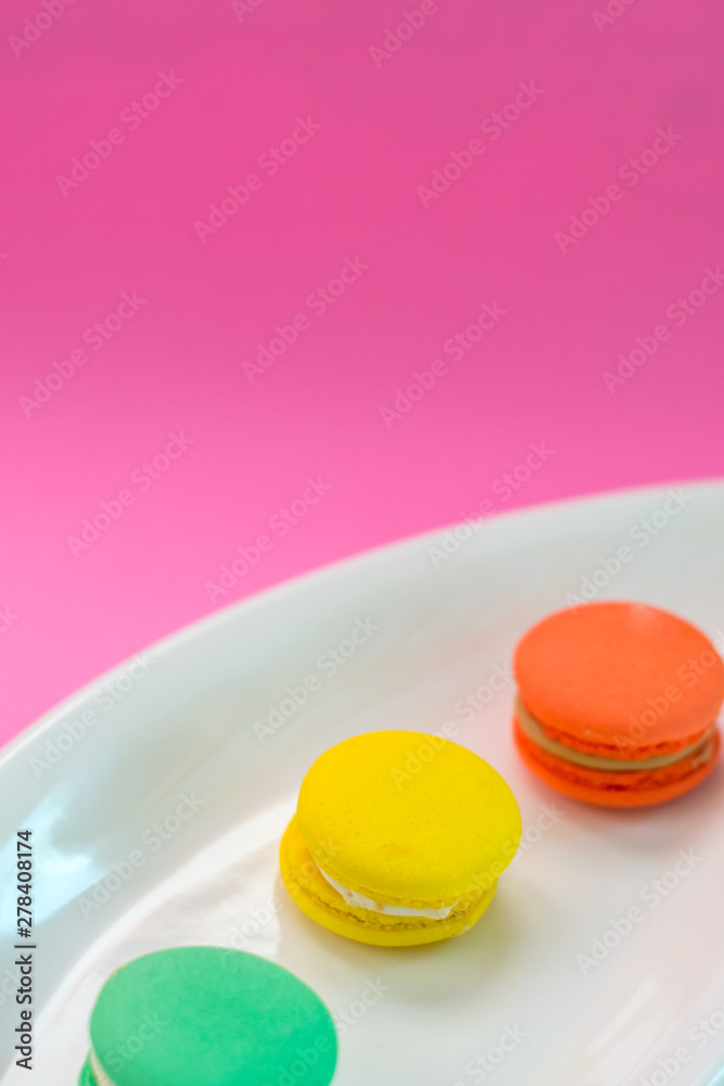 Close-up shot of colored macaroons in different position Close-up shot of colored macaroons in different position