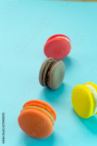 Close-up shot of colored macaroons in different position © krash20
