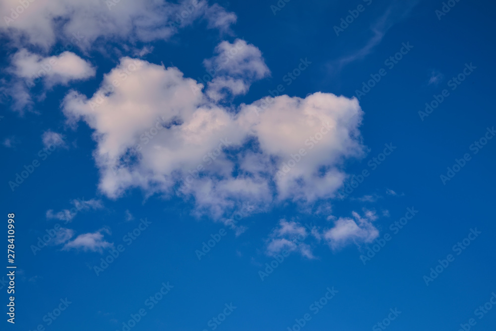 Blue summer sky white cumulus clouds background. Blue summer sky white cumulus clouds background.