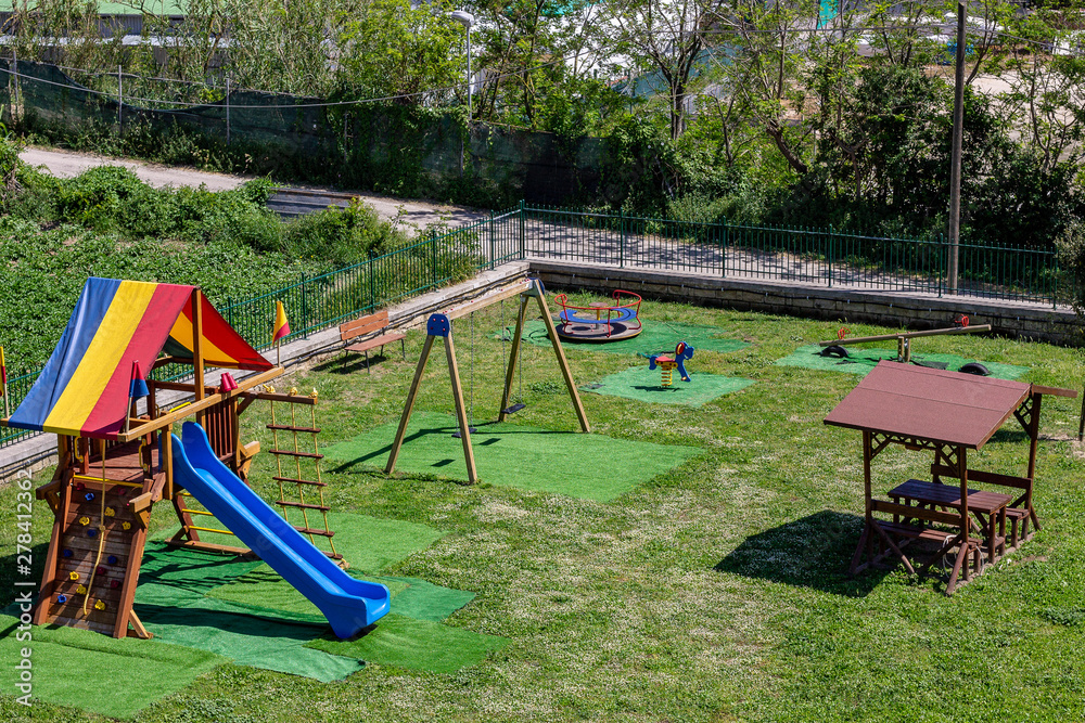 Bacoli, Naples, Italy May 25, 2019. In the park of the children's rides, the slide, the swing. Bacoli, Naples, Italy May 25, 2019. In the park of the children's rides, the slide, the swing.