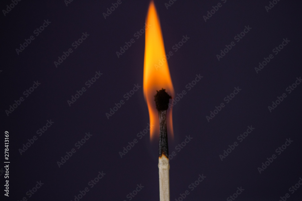 Close up Macro shot of a ignition match on a second match captured in super slow motion Close up Macro shot of a ignition match on a second match captured in super slow motion