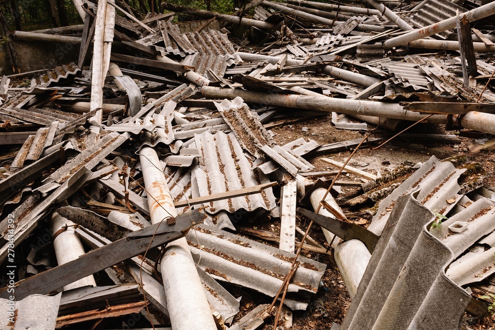 Dilapidated building with reinforced concrete columns and broken slate. Dilapidated building with reinforced concrete columns and broken slate.