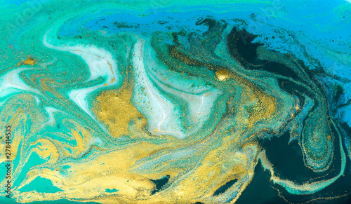 Blue, green and gold marbling pattern. Golden powder marble liquid texture.