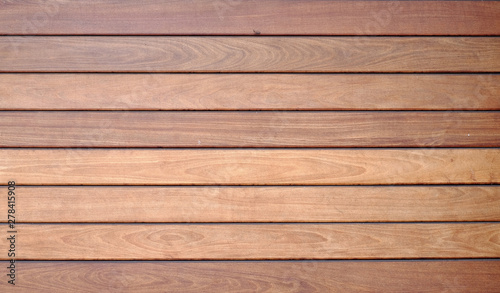 Wooden planks varnished pale warm timber texture and pattern.