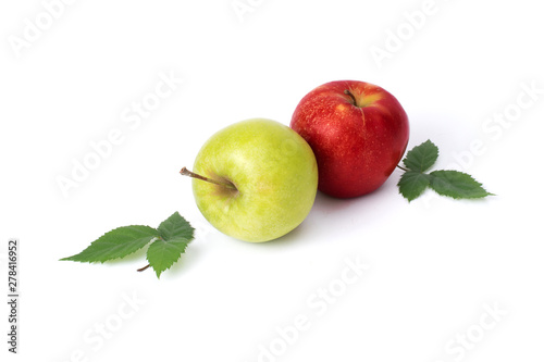 Red and green apple on a white background. Green and red apples juicy on an isolated background. A group of two apples with green leaves on a white background.