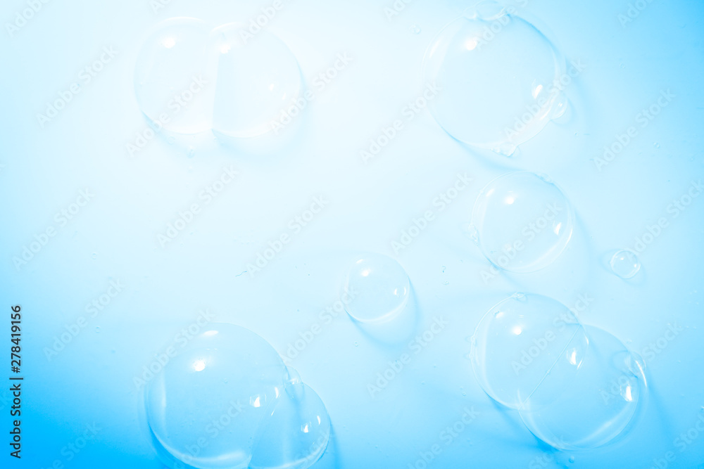 Beautiful abstract close up color white and blue soap bubbles background and wallpaper