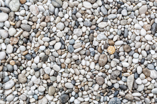 Quadro su tela Sea pebbles background
