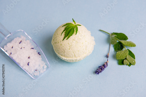 Cannabis wellness products with bath bomb and soaking salts photo