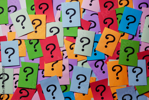 Background texture of multicolored question marks